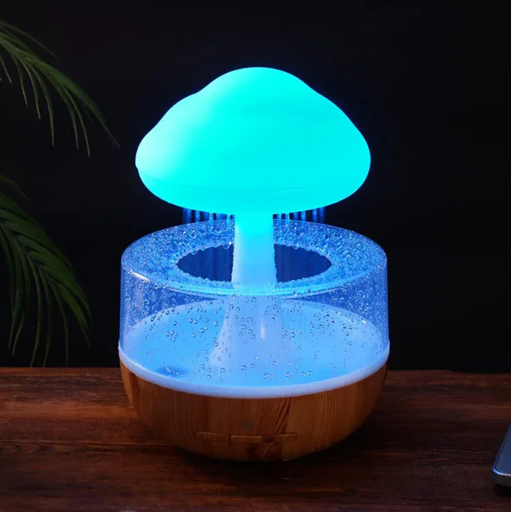 Mushroom-shaped smart humidifier with glowing blue LED light and water tank on wooden table