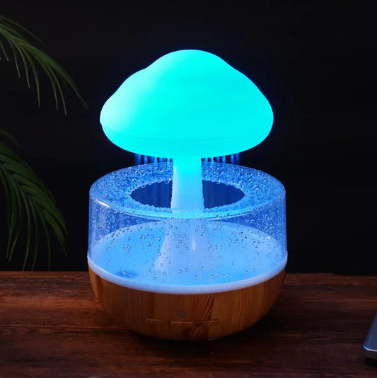 Mushroom-shaped smart humidifier with glowing blue LED light and water tank on wooden table