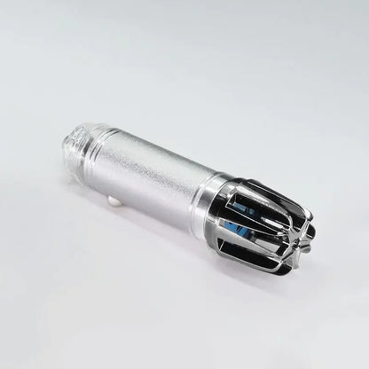 Silver nose hair trimmer with protective cap on white background, modern grooming gadget