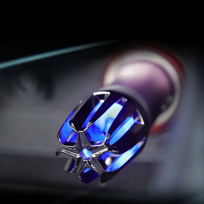 Close-up of a futuristic blue LED car air purifier plugged into a car socket